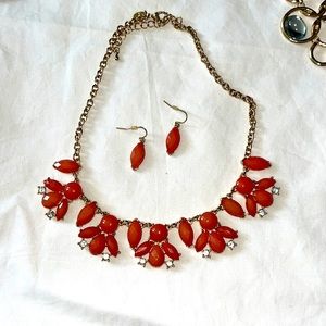 Pink and gold chunky necklace with matching pink earrings